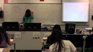 Deriving the Frequencies for a Stringed Instrument - Standing Waves on a String