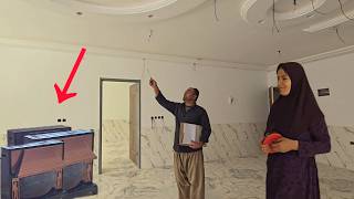 Family is happy to buy a stove, but Khosrow's concerns about other building materials continue