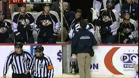 Jordin Tootoo asschecks Milan Michalek then takes ...