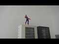 Spider-Man sneaks around a giant gorilla