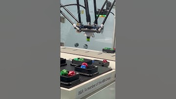 ABB Robotics Flex Picker Robot picking up dice at Automate 2023