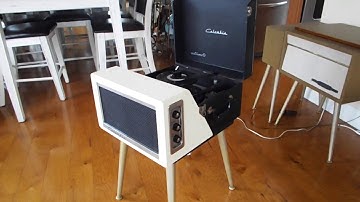 Columbia Hi-Fi record player playing a stack of 45