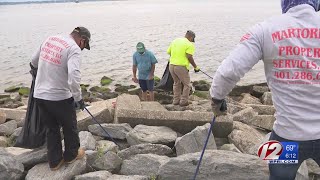 Volunteers help clean up Conimicut Point Beach