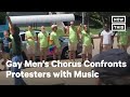 Gay Men's Chorus Confronts Protesters With Music | NowThis