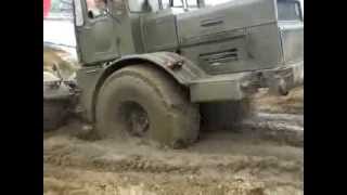 Russian monster tractor Kirovets K-700 rides through the mud