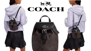 coach amelia backpack Saddle Bag in Military Green Chic Boutique Consignments Soft pebble leather Inside zip pocket Snap closure fabric lining Top handle with 1 1/2 drop Adjustable straps convert bag to a crossbody bag from a backpack 6 1/4 (L) x 7 1/2 (H) x 3 1/2 (W) Style No. Amelia Convertible Backpack Coach Elle