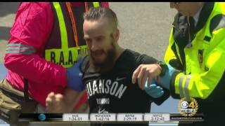 Runner In Agony Helped Across Boston Marathon Finish Line