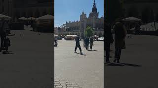 Rynek Glowny in Krakow and points of focus:  St. Town Hall Tower, Cloth Hall and St Mary's Basilica