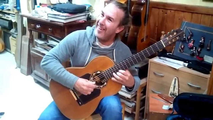 Albertus plays an old Eduardo Ferrer guitar in Gra...