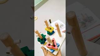 geometric shape sorter for toddlers to improve their fine motor skills and hand eye coordination #hi
