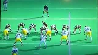 Michigans Marcus Ray Lays The Wood To Cus Herchell Troutman