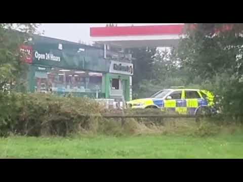 ARMED HOSTAGE SIEGE AT PETROL STATION IN BRISTOL, ENGLAND.