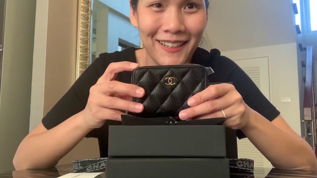 Unbox Chanel zippy coin purse in Black caviar - YouTube