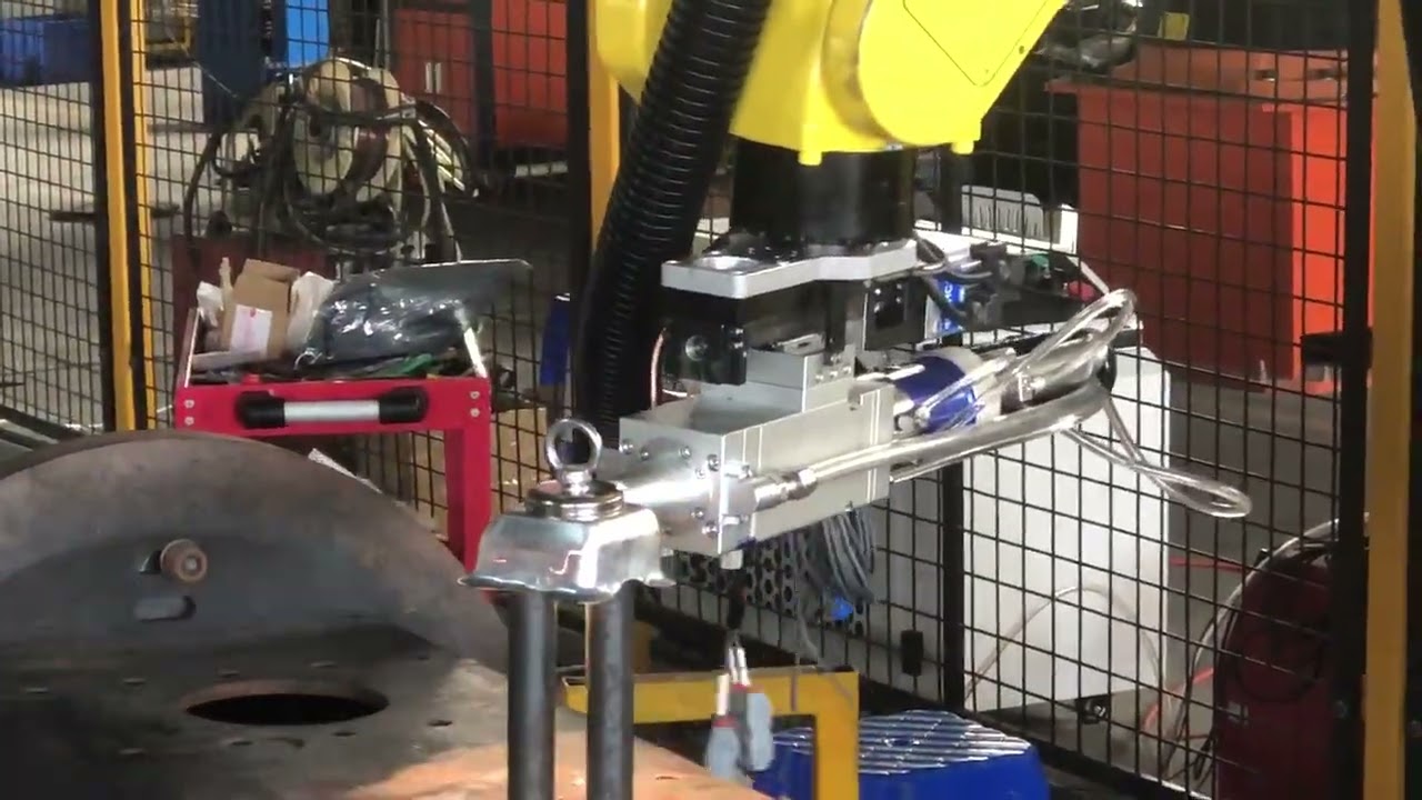 laser cutting automation by Fanuc M-20iA 