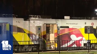 Crews rescue person trapped under Light Rail train in Lutherville