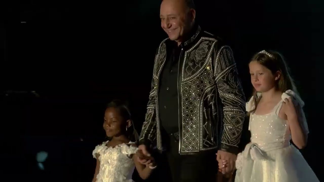 Fashion for the Stars show.  Models Talk catching up with designer Jacob Meir's New line!