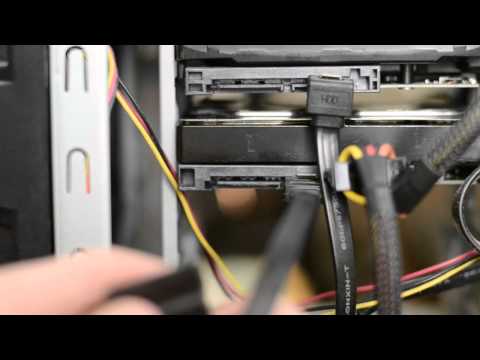 Video: How To Insert A Hard Drive Into A Computer