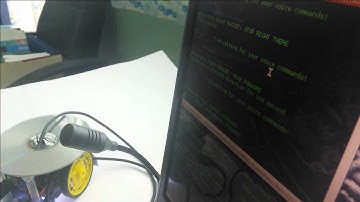 A Voice Controlled Low-Cost Robot Using Arduino, Pocketsphinx, Firmata and Racket (version 1)