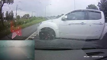 Truck Causes Close Call on Rainy Road || ViralHog