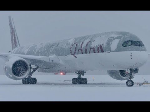 Qatar A350 1000 Snowstorm DepartureTowing in Quebec City YQB