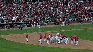 Cards walk off on Spilborghs' error