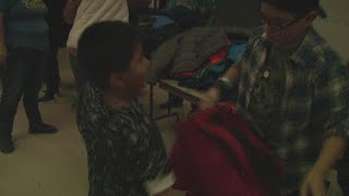Hundreds line-up for annual coat giveaway in Modesto