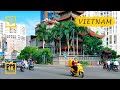 Walking in Vietnam. Ho Chi Minh City walk: District 1 to Airport. Binaural Audio. [4K walking tour]