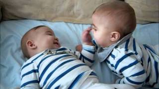 Twin babies laughing and having fun:)