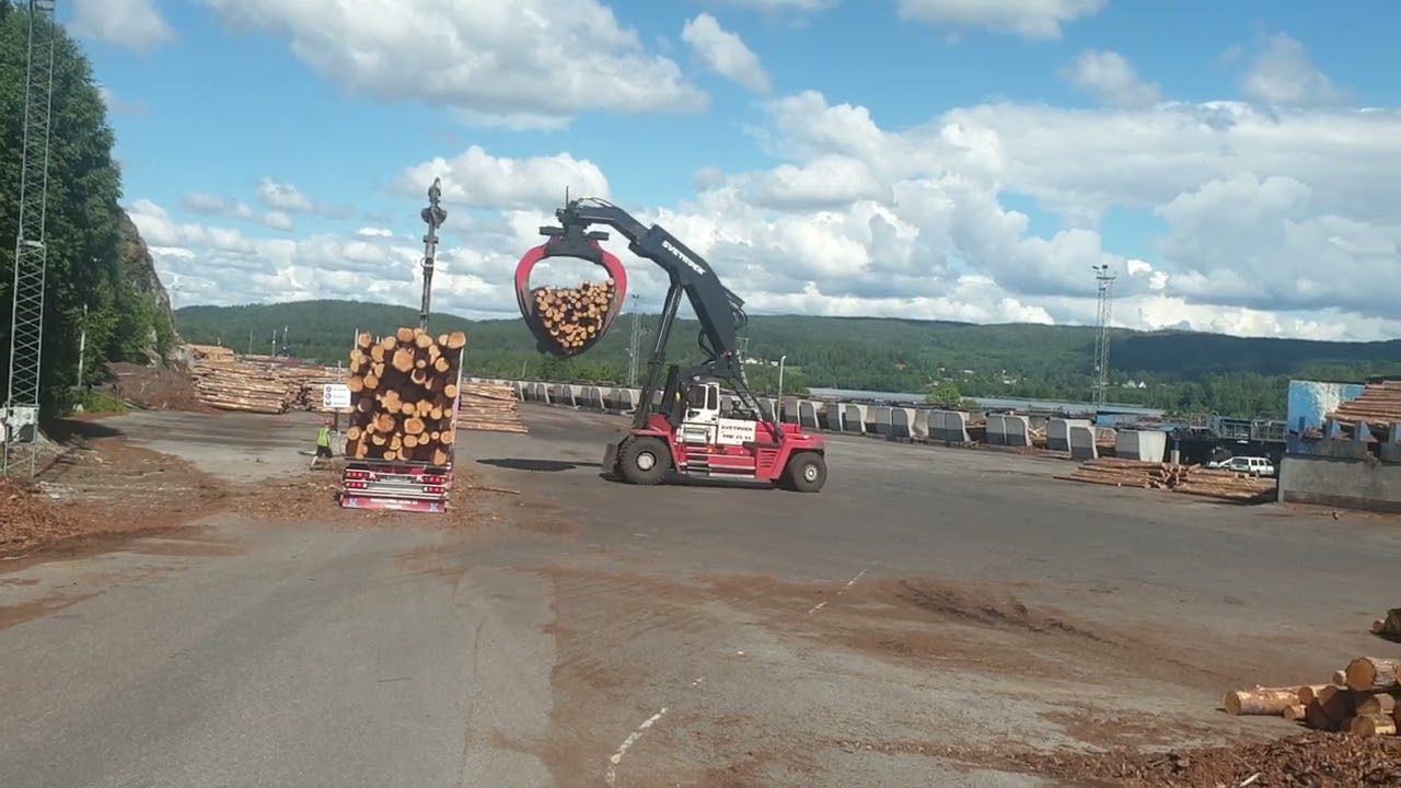 unloading timbertruck at Bollsta sågverk  in Västernorrland Sweden. sommer 2022