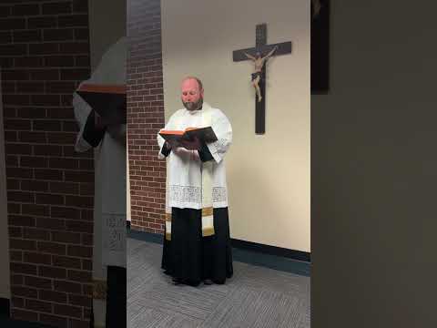 Father Nathaniel blesses Ave Maria Catholic School