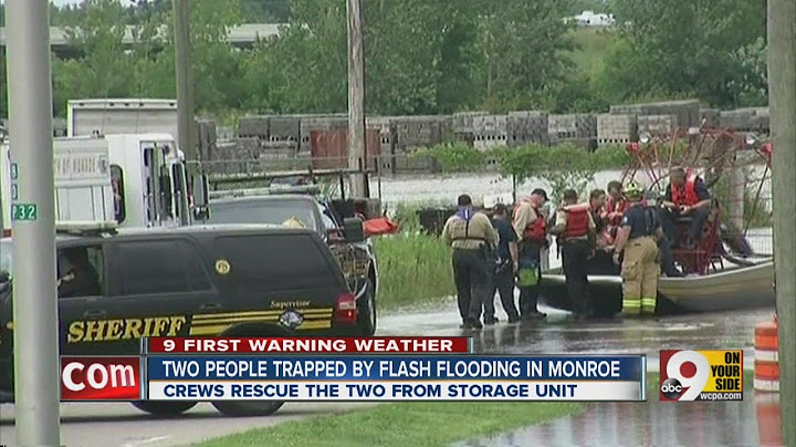 Two people trapped by flash flood in Monroe