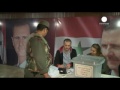 Syria: Polls and peace talks as fighting escalates