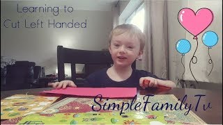 Child Learning to Cut with left hand