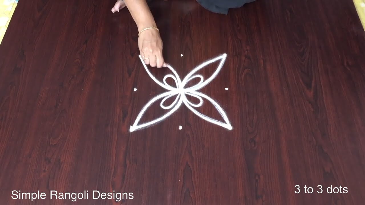 3 into 3 Pulli Kolam