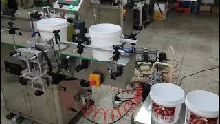 small bucket wrap around labeler #yqmachinery #labelapplicator #manufacturer