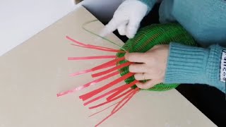 Use the packing tape to weave the vase (top) with thin plastic steel strips, all cut with scissors