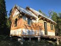 Magic Hammer Action and Cedar Shingle Siding on the West Side of the Off Grid Cabin in the Woods