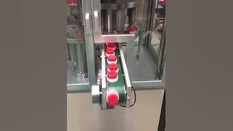 Flip top caps assembly machine high speed assembler