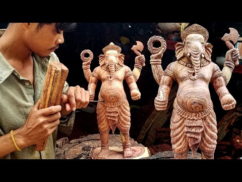 Wood carving - Hand carved wooden statue of Lord Ganesh made with real