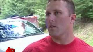 Driver Rescued From Overturned Car in Icy Waters