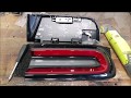 Cutting open 2015+ Dodge Challenger outer tail light...