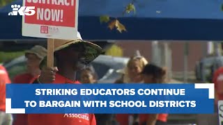 Striking educators continue to bargain with school districts