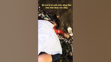 Hình ảnh bé trai được cứu sống khi bị lũ cuốn trôi trên sông Hàn - Bà con Huế Đà Nẵng cố lên ❤️❤️❤️