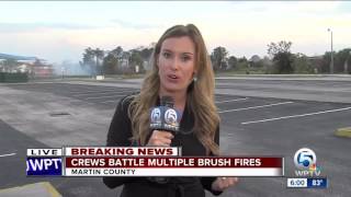 Crews battle multiple brush fires