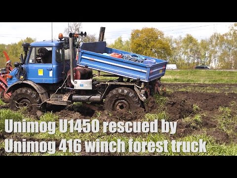 Unimog 416 recovers Unimog U1450 out of the mud