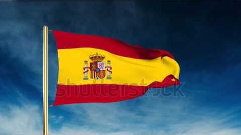 Spain flag slider style. Waving in the wind with cloud background animation Stock video by
