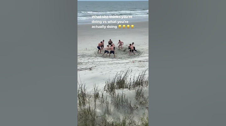 Guys Being Dudes Wrestling On The Beach
