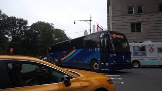 NYC Bus: Sunnyside bound X3-45 1566 SIM30 at Central Park South/7 Av