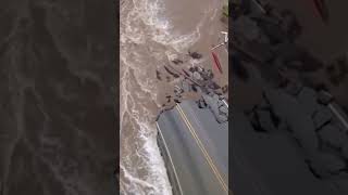 Raging floodwaters wash away road in historic Indiana flooding