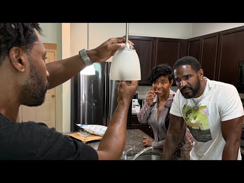 Charles walks in while Kendrick is changing a light bulb!
